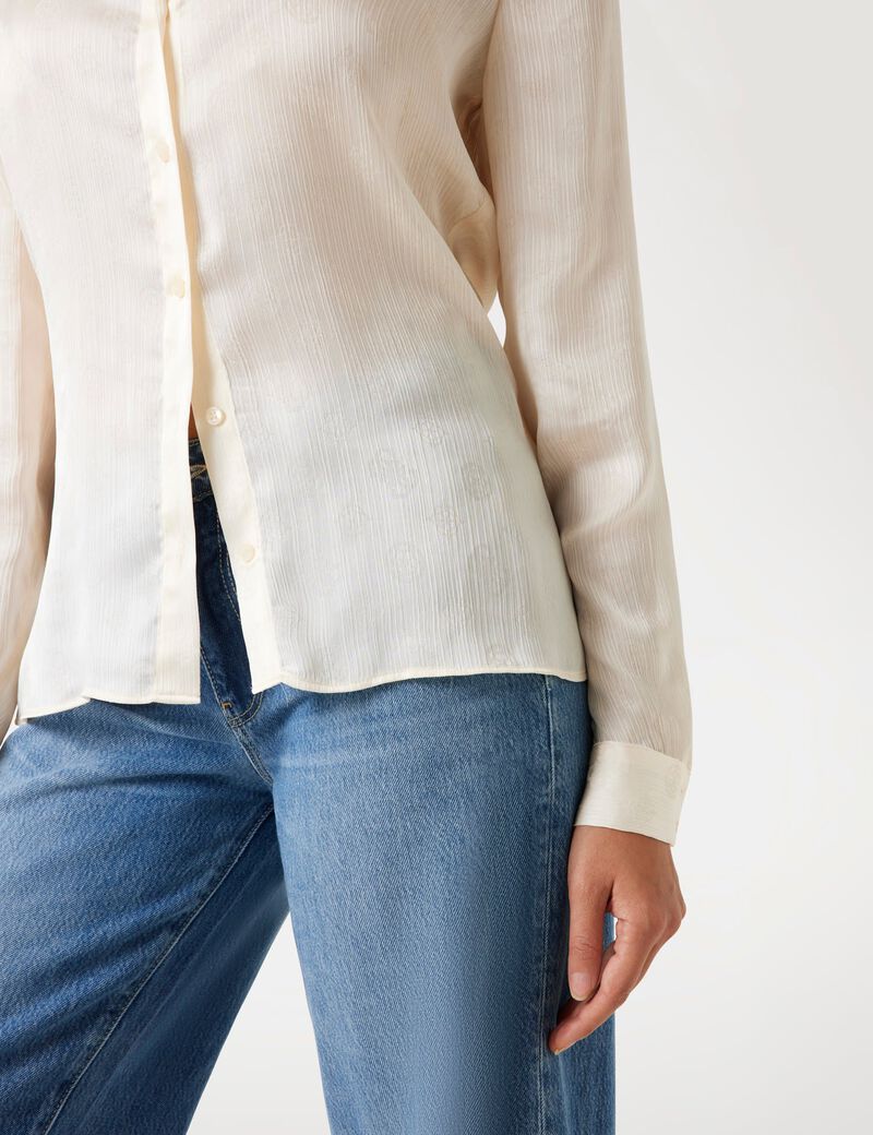 قميص بشعار 4G وزهرة الفاوانيا