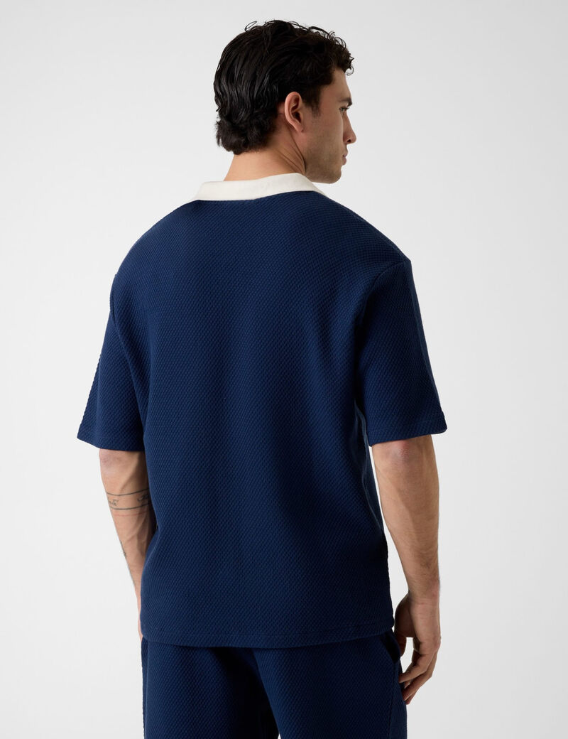guess triangle logo polo