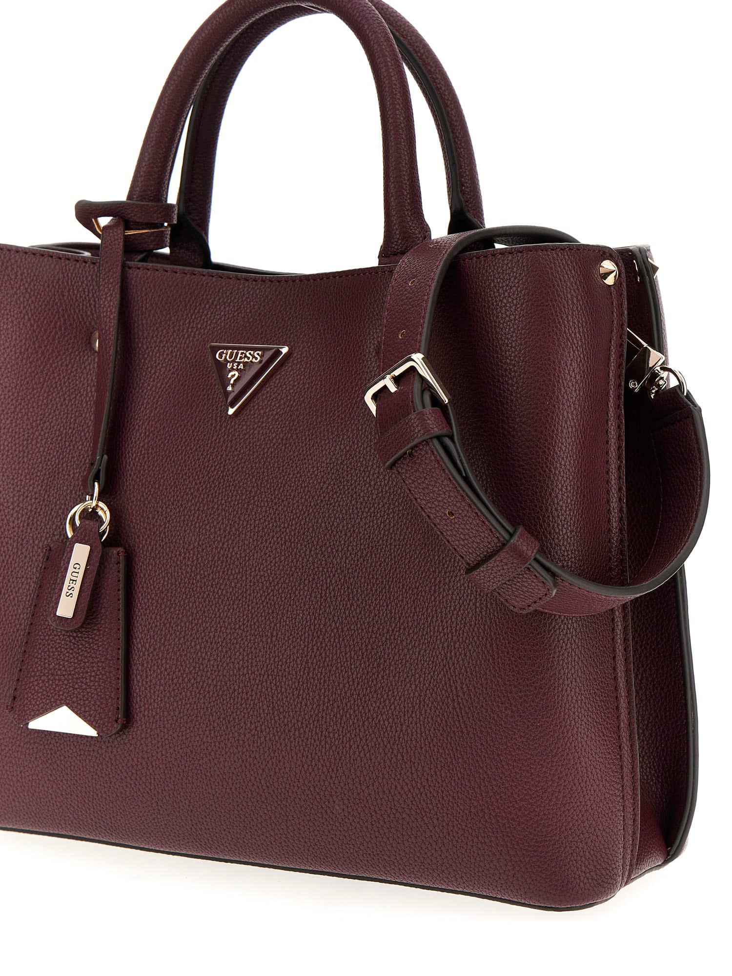 Shop GUESS Online Meridian studded handbag